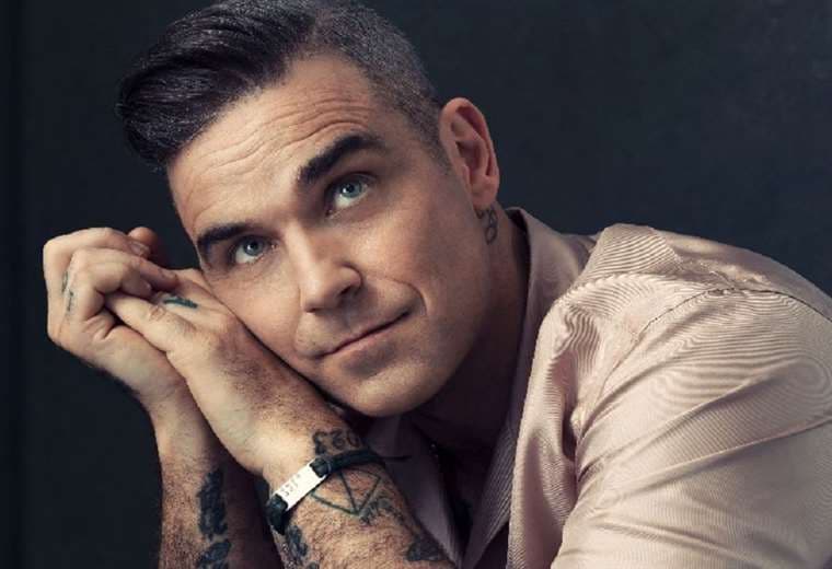 Robbie Williams se reúne con su exgrupo para un concierto benéfico